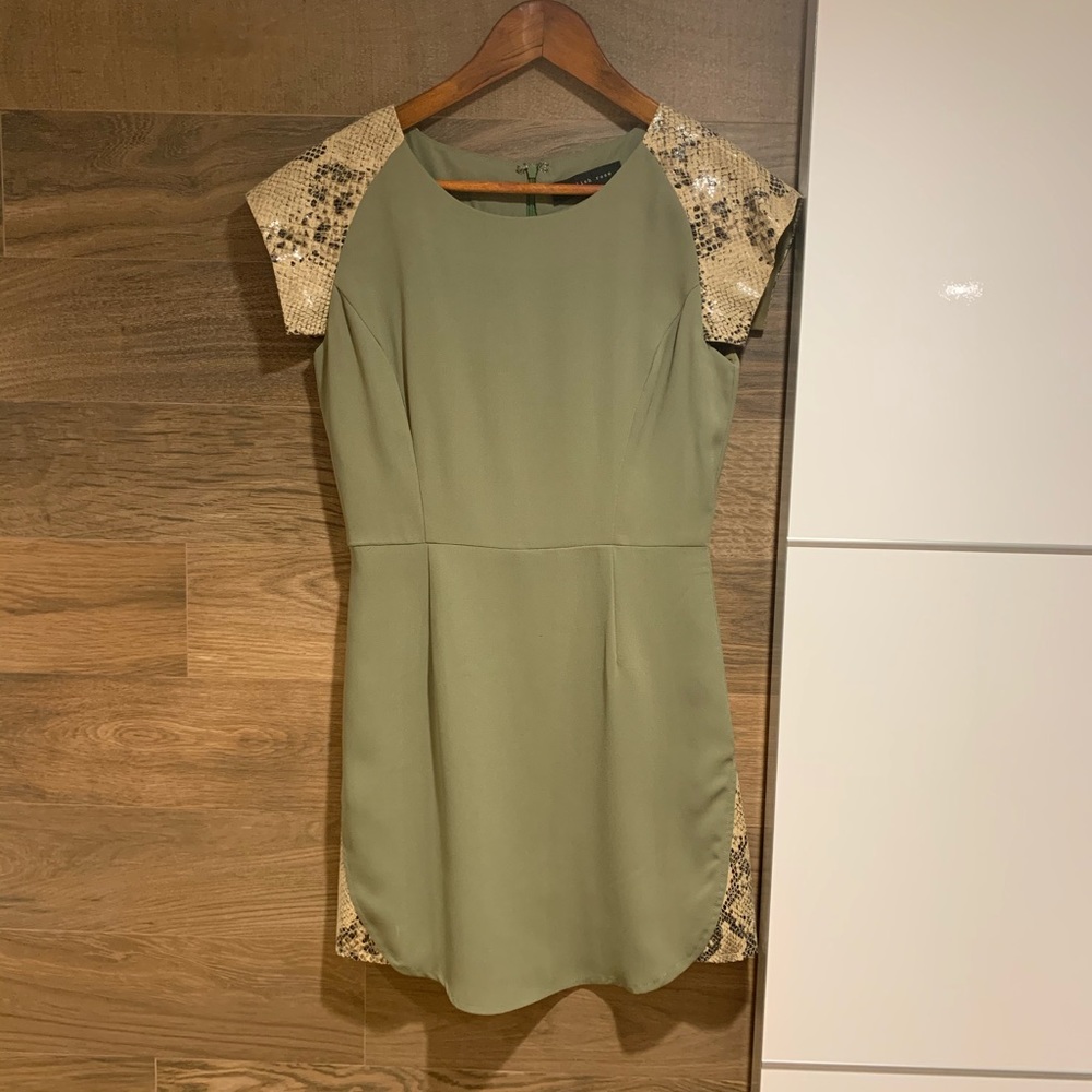 Mini dress with snake skin sleeves